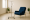 Comfortable blue IV therapy chair with IV bag stand in a modern clinic room