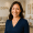 A professional team member smiling in the MedSpa lobby at Advanced Life Clinic.