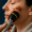 Close-up of a medical device examining pigmentation spots on a woman's cheek